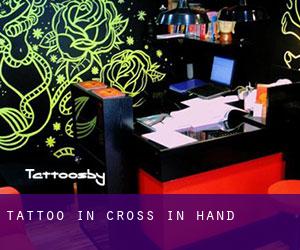 Tattoo in Cross in Hand